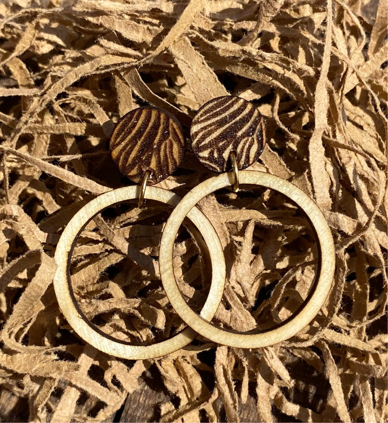 Wooden dangle earring “Circular Zebra”