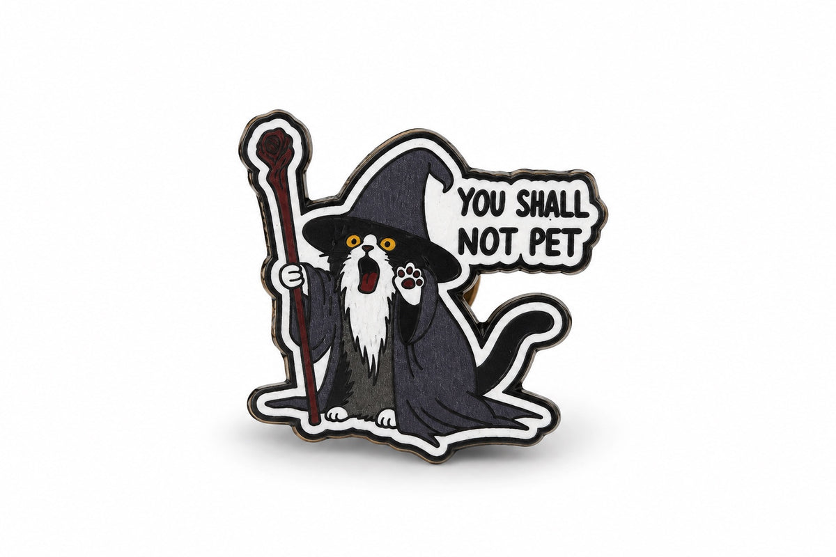 Close-up product photo of wizard cat wooden printed pin saying You Shall Not Pet