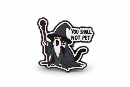 Close-up product photo of wizard cat wooden printed pin saying You Shall Not Pet
